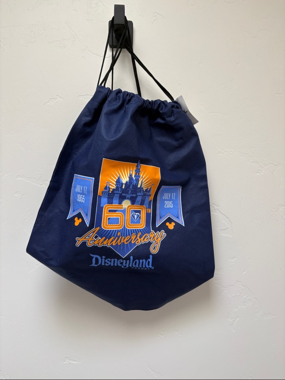 Disney Navy 60th Anniversary Drawstring Backpack with Orange Accent